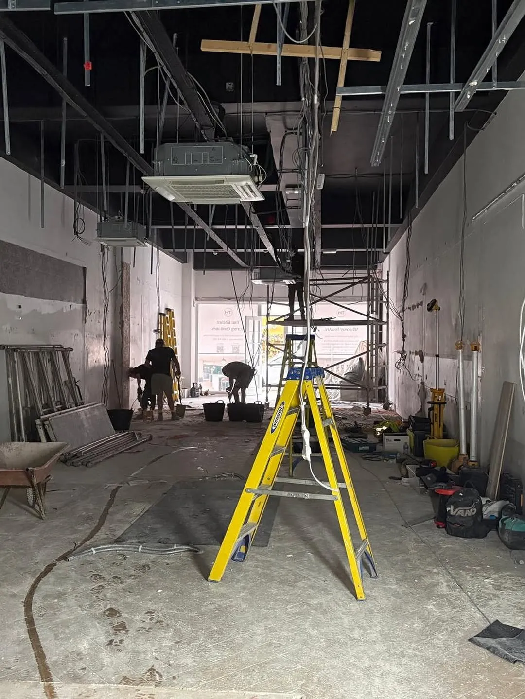 First-fix electrical containment in an open ceiling during a refurbishment