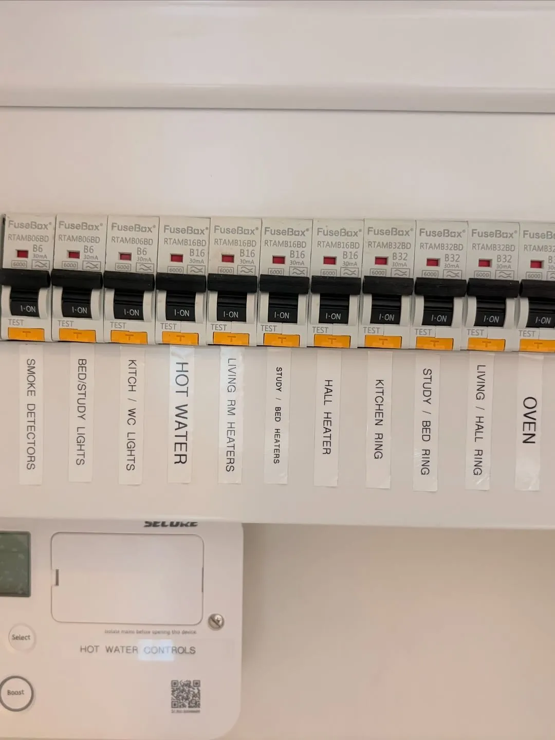 Row of circuit breakers with clear printed circuit labels